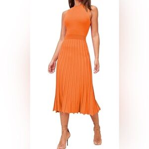 New Never worn orange sleeve less dress size medium